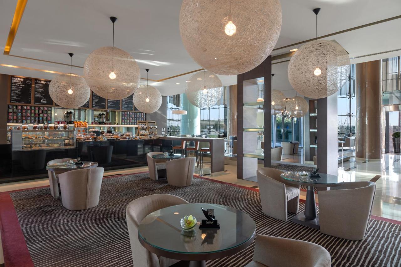 Hotel Park Rotana Abu Dhabi Esterno foto The Lounge at the airport